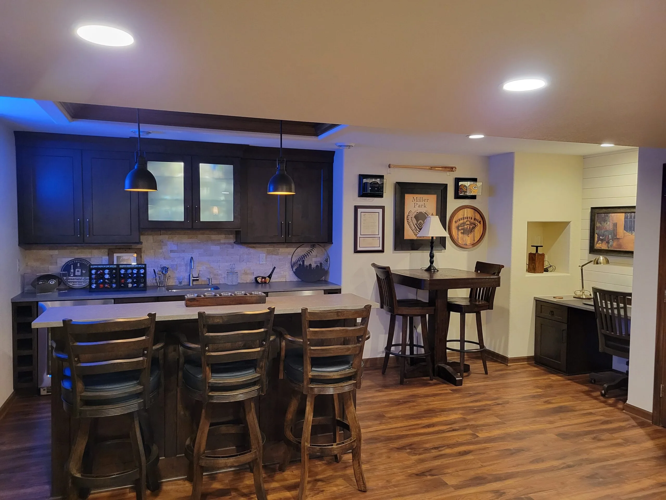 Sports-themed basement bar