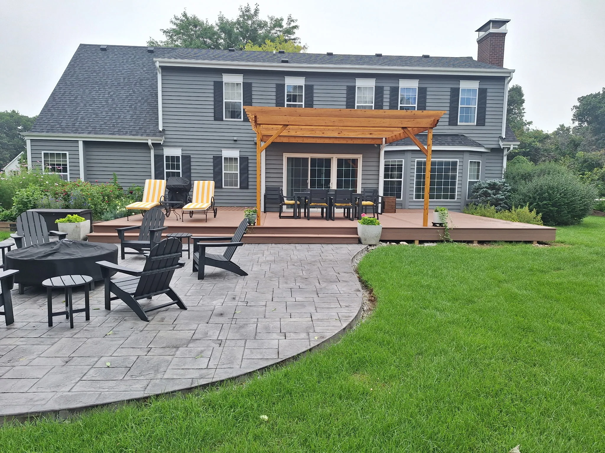 Large backyard deck and pergola
