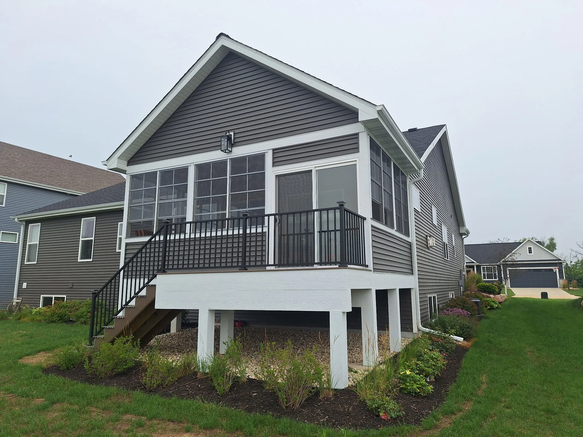 Elevated screened porch with stairs